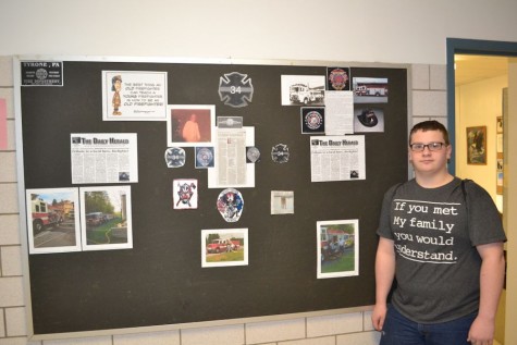 Skylar Witchley, the author in front of a tribute to O'Brien created by Tyrone Officer "Bub" Dick.