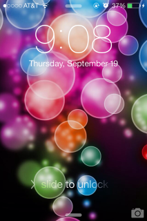 The new iPhone iOS 7 lock screen. When you slide to unlock, the keypad blends in with the background!