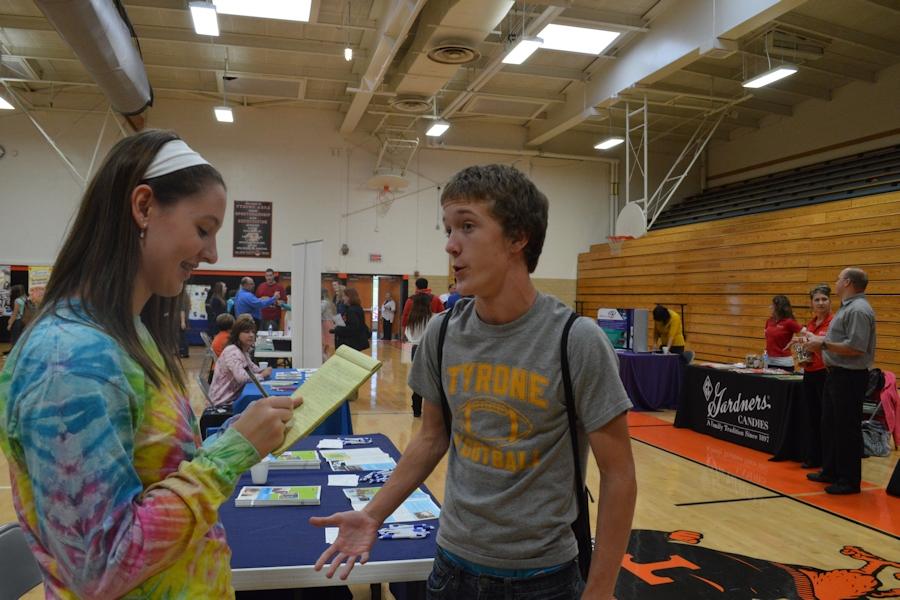 Olivia Bietz interviewing Adam Zook at the Career Expo