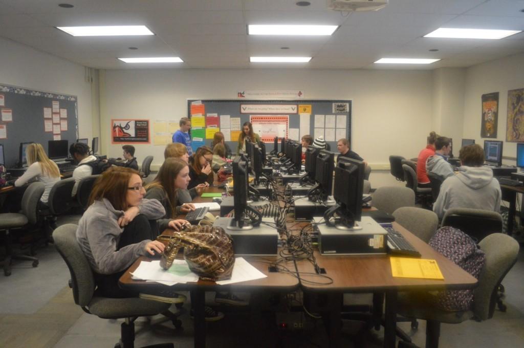 Eagle Eye writers and photographers hard at work in the Eagle Eye staff room.