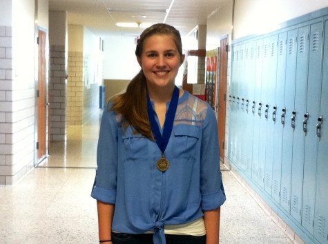 Eighth grade student Chloe Makdad with her first place Pennsylvania State History Day Award