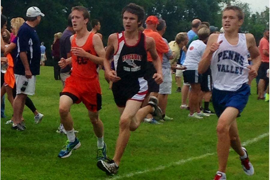 Tyrone runner Adam Zook (left) crossing the finish line at the Big Valley invitational