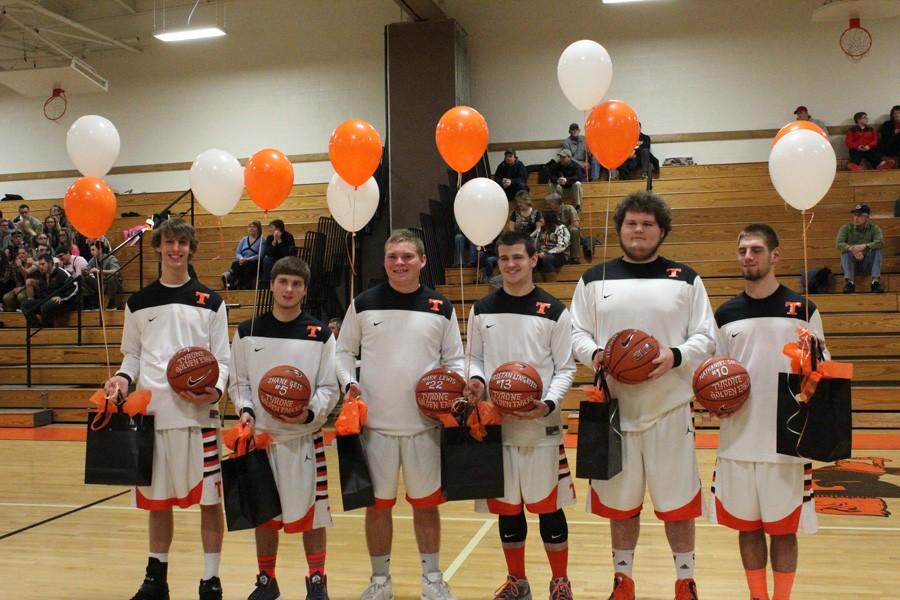 Senior basketball players Blake Brooks, Shane Geis, Mark Lewis, Tristan Lingafelt, Preston Mitchell, and Nathaniel Soellner.