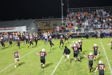 Tyrone junior Ricky Tyrone celebrates after Ricky Reader made the game ending sack to seal the victory against Bellwood.