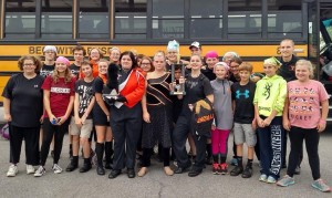 The band celebrates their first place finish at St. Marys