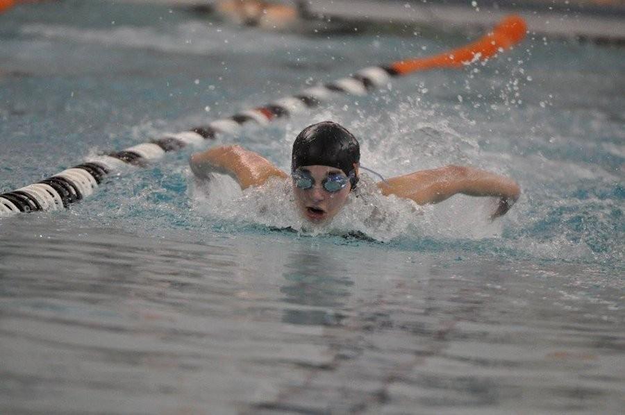 Senior+Emily+Beam+swims+the+butterfly+portion+of+the+200+IM+last+season+%28file+photo%29