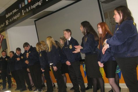 Members receive their first FFA jacket at the TAHS Ag Program Banquet