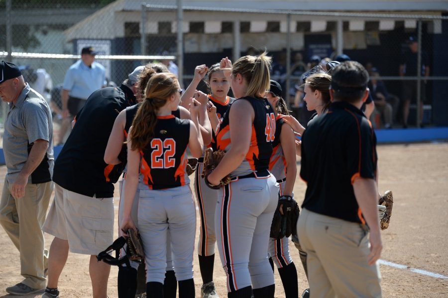 Ella Pearson, Emily Lehman, Emily Hamer, and Coach V.