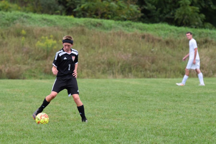 Sophomore Kelton Raabe receives the ball in midfield.