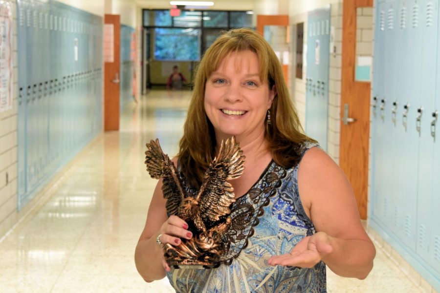 Mrs. Myers with Be Golden statue.