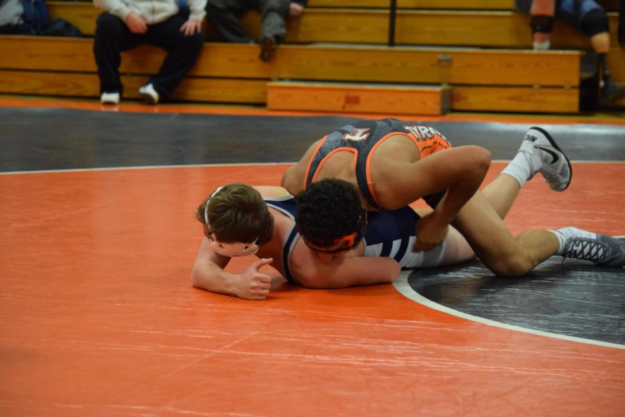 Tyrones Tommy Hicks works to turn his opponent.  He pinned Penns Valleys Dristen Wolfe in the last 1:29 in the match.