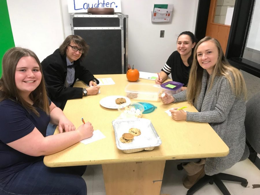 Eagle Eye staff judges (l-r) Emma Hoover, Haydn Loudenslager, Grace LeGars, and Ava Focht eating and grading entries on the first day of the cookie contest.