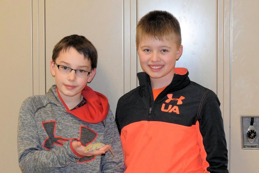 Colin Burket (left) holding Larry the Gecko and Alex Starr (right) are two fifth grade students who just switched classes for the first time.