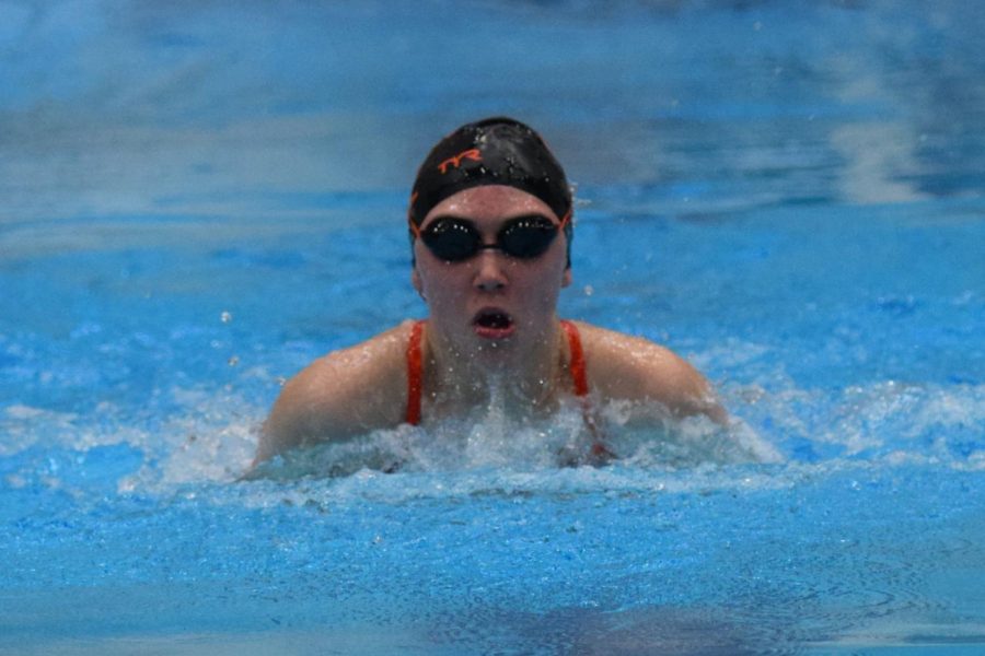Sophomore Sarah E. Hoover swimming the breaststroke in her individual event where she placed fifth.