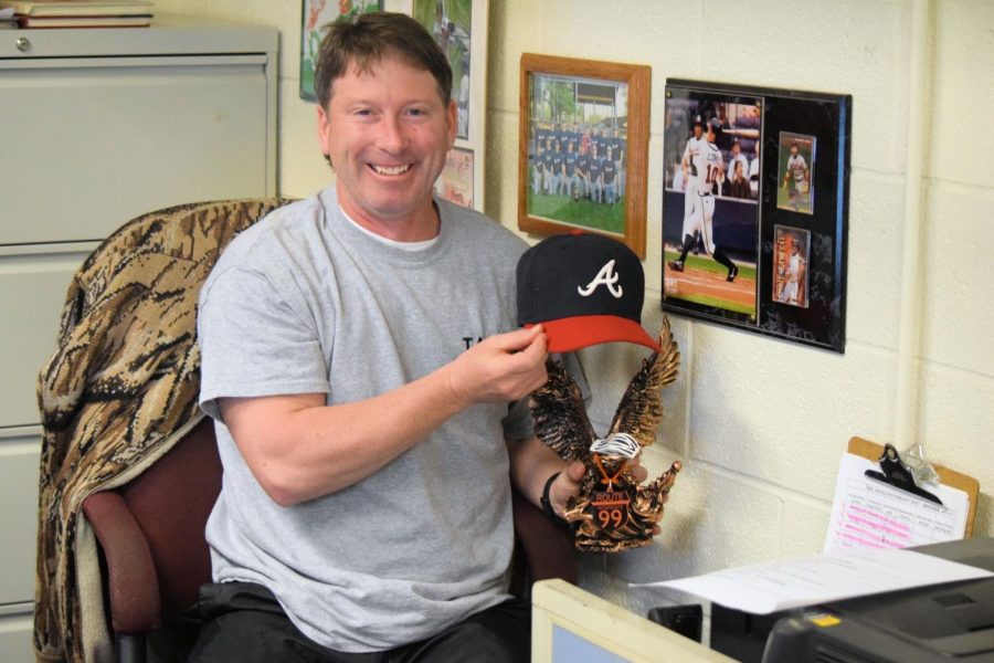 Jimmy+Coleman+shows+off+some+of+his+favorite+Atlanta+Braves+items+in+his+office