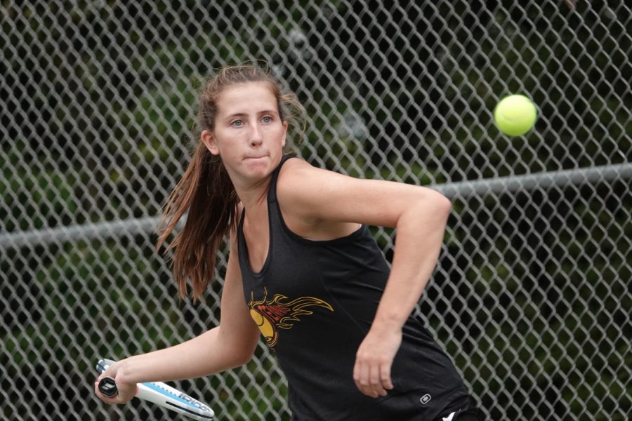 Winnie Grot hits a winning shot.