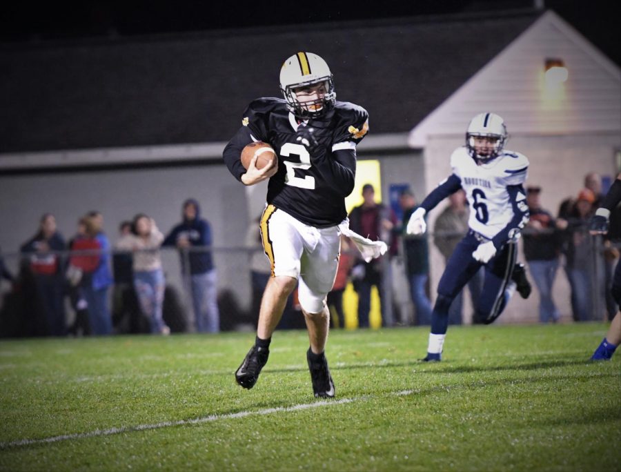 Brandon Lucas sneaking his way through the PO defense searching for a first down. 