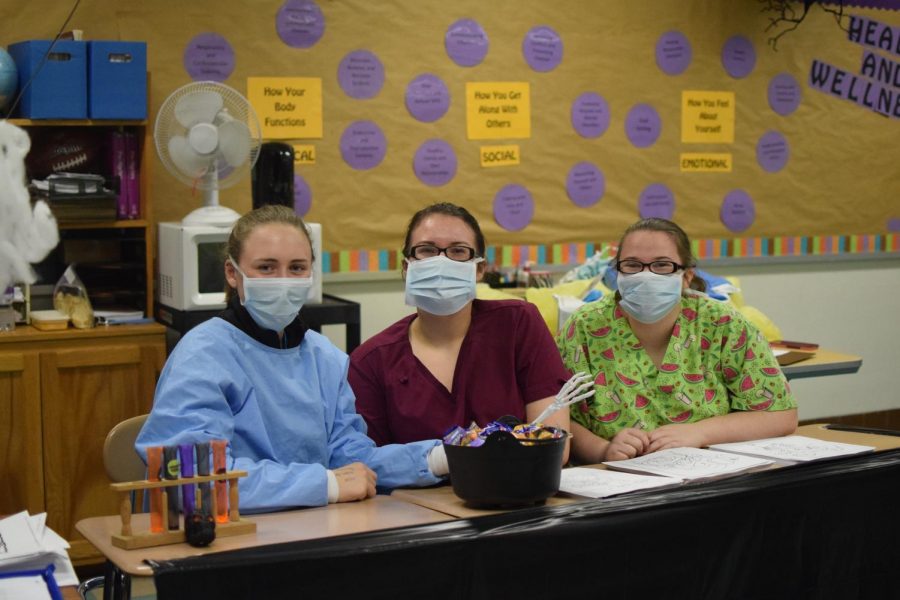 Sarah Hoover, Maddie Diebold, and Jadyn Waite, all members of Tyrone High School HOSA Club volunteered at last year's YAN Halloween Event.