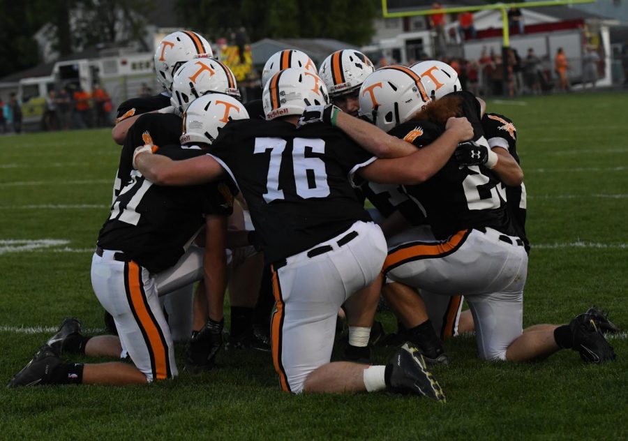 The Team huddled together during the Central game.