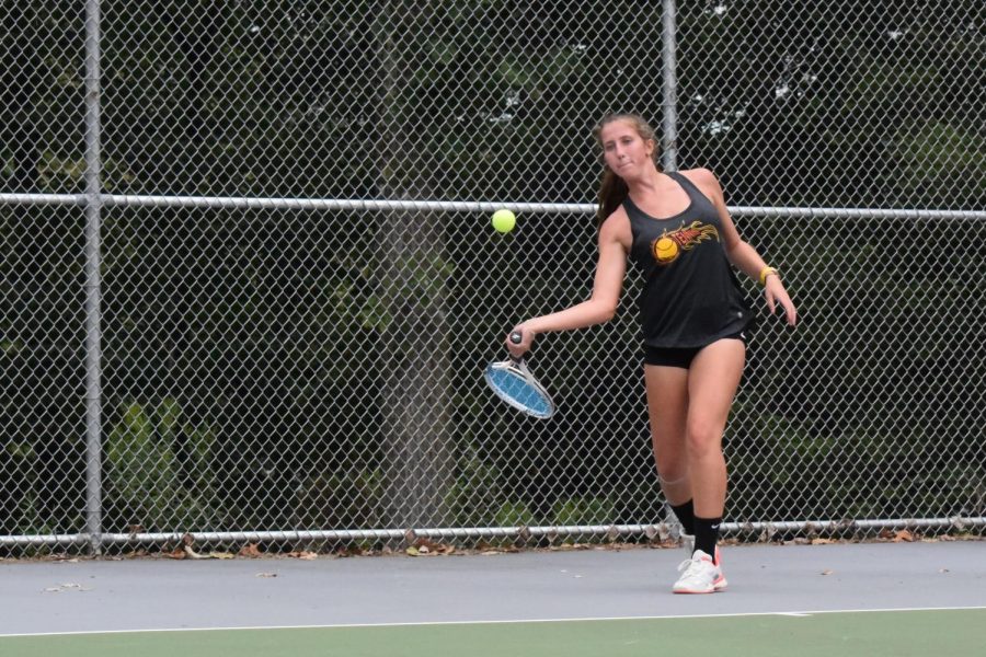 Winnie Grot goes for a forehand in her win vs. Ally Gaines (C) 6-0, 6-0.