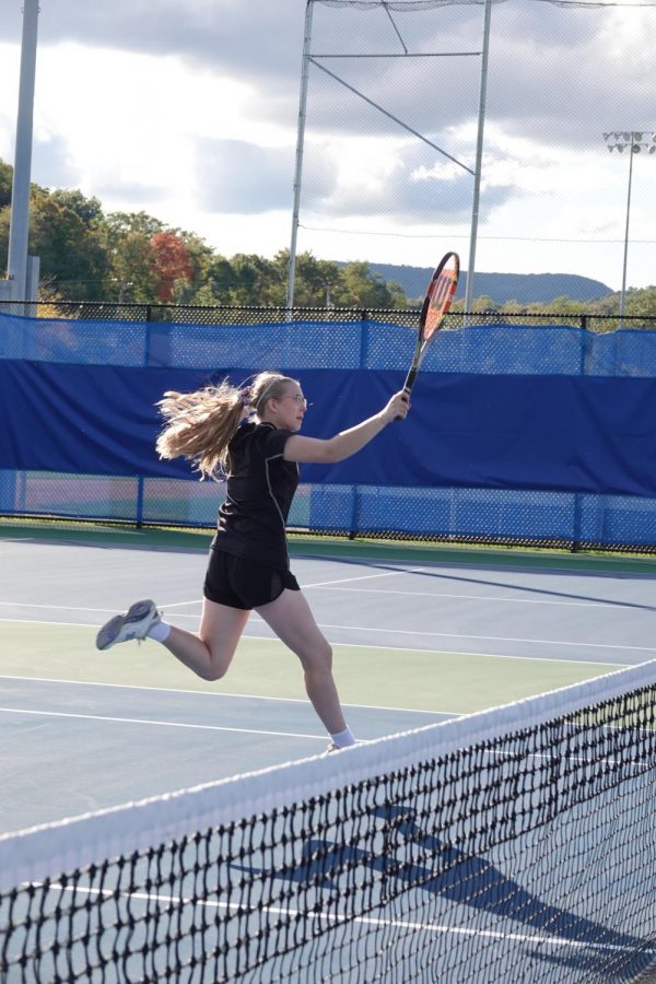 Megan Dale hits an awesome shot at the net. 