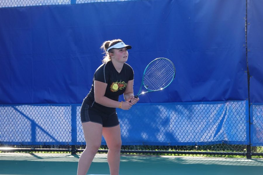 Olivia Reese gets ready to return a serve.