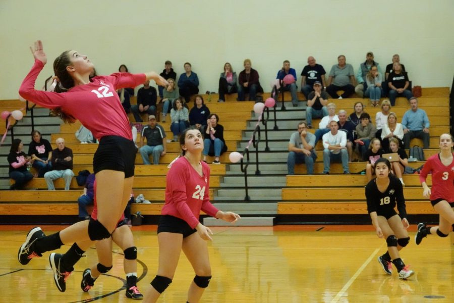 Makenna Bauer going up for a kill.