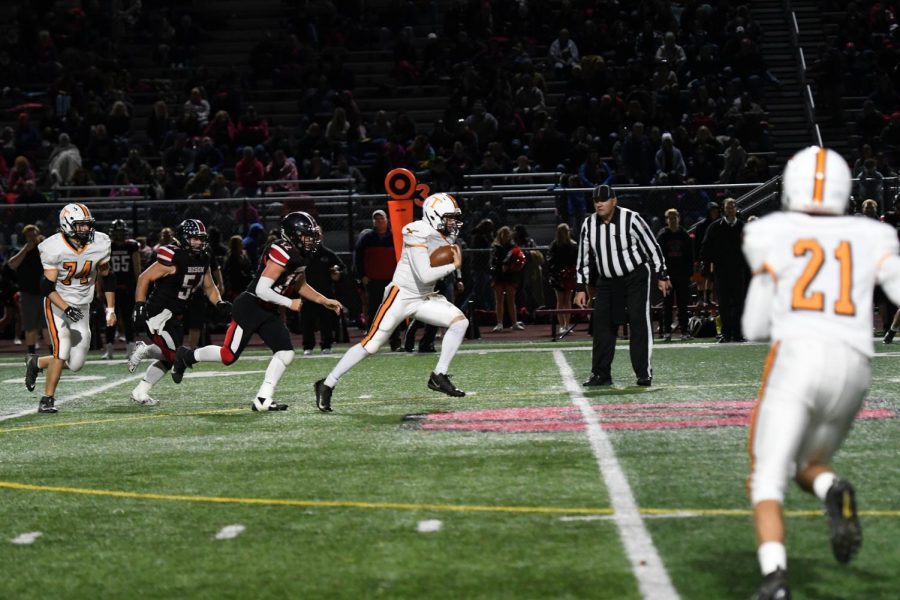 Brandon Lucas runs for a first down.