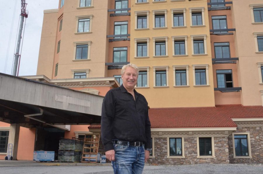 Tyrone developer Jeff Long stands in front of his most recent and largest project to date, the transformation of the former Bon Secours Hospital in Altoona into a Greystone senior apartment complex.