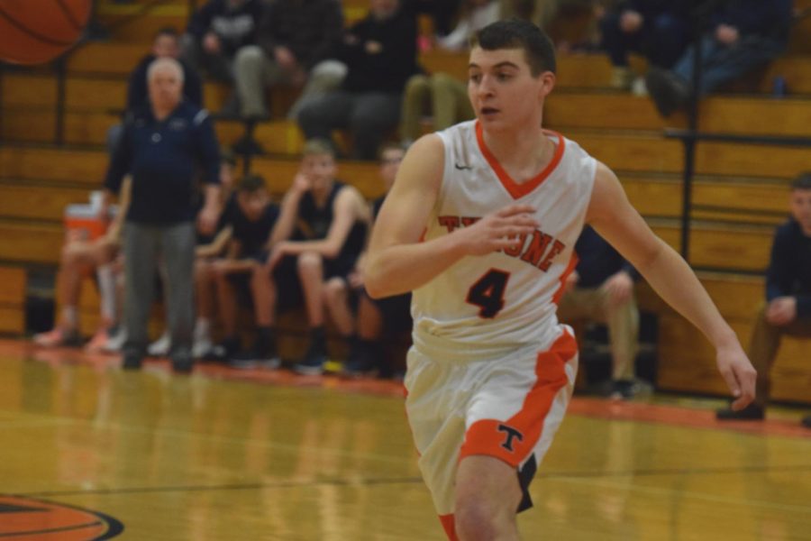 Brandon Lucas guarding opponent.