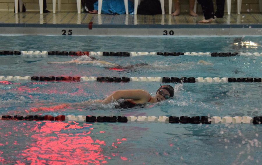 Madison Coleman swimming her final lap.