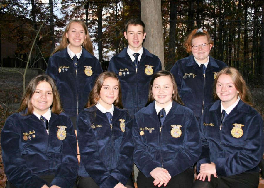Picture: Front row left to right – Elizabeth (Libby) Buck, Kaitlyn Houck, Grace Peterson, Rayann Walls. Back Row left to right – Karly Diebold, Garin Hoy, Jillian Williams.
