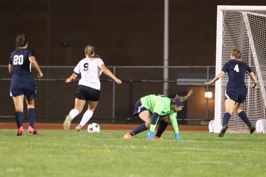 Junior Chloe LaRosa heading towards the goal after the Penns Valley keeper missed the ball.