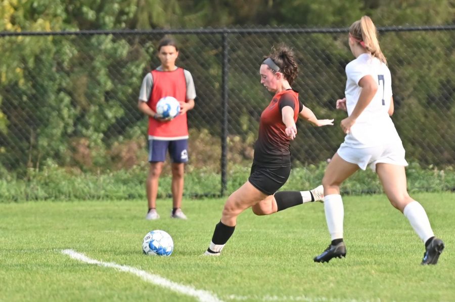 Junior Avalyn Moore preparing to shoot the ball at the goal. 