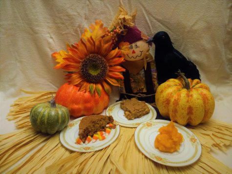 A triad of sweet treats is presented upon a backdrop of Halloween ordaments.