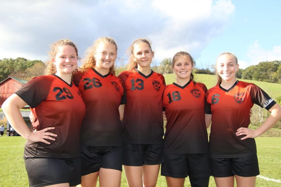 The Tyrone and Bellwood seniors on the Lady Eagles Soccer team.
