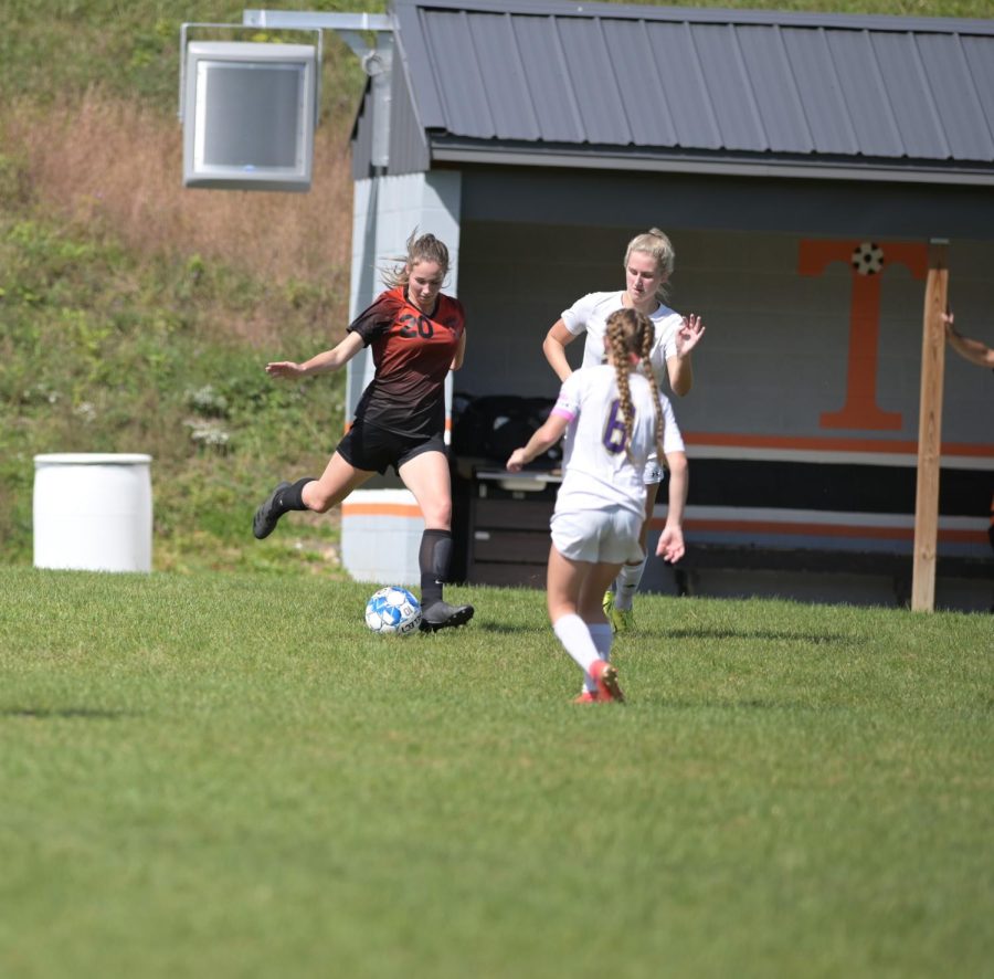 Junior Eliza Vance getting ready to cross the ball from the left side of the field.