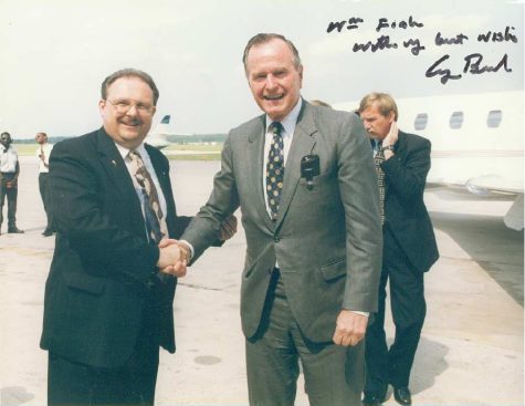 Fink shakes GHW Bush's hand