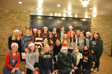 Twenty-four National Honor Society members took time out of their day to volunteer with Toys-For-Tots in State College. 