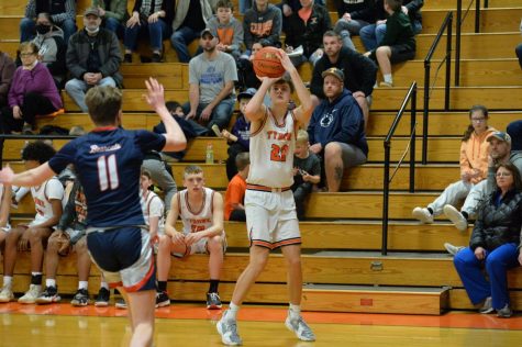 Senior David Lang connects on one of his 5 three pointers. Lang finished with 15 points. 