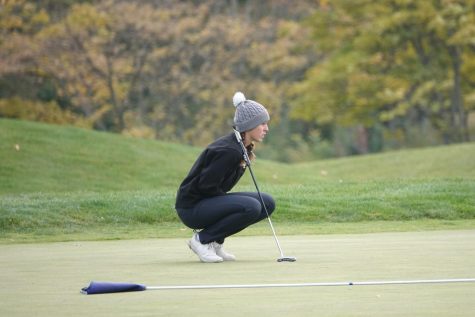 Miksich lining up a putt on the 16th green at States. 
