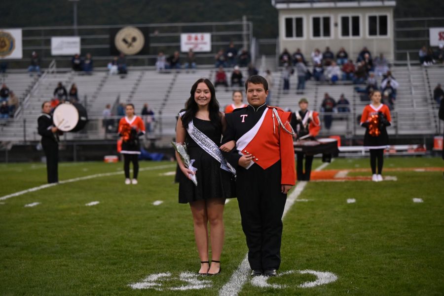 Laci Daniel representing marching band and escorted by Joseph Davis.