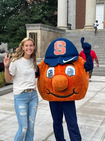 Hailey poses with the Syracuse mascot