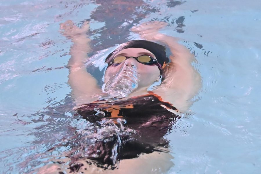 Sports Photography, first place,Tyrone senior Victoria Reese in the backstroke vs. Altoona