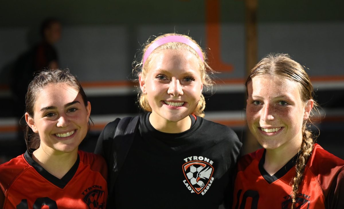 The three senior captains; Rebecca Lewis, Lainey Quick, and Maddy Whitby.