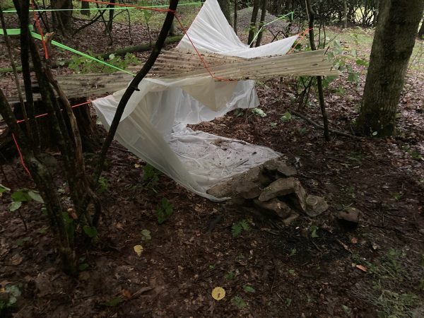 Eckenrode was able to create a shelter out of found material and a small tarp that was part of the survival kit given to contestants. 