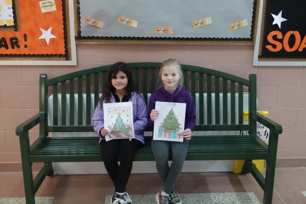 First grade winner Quinn Rivera and second grade winner Violet Sherry