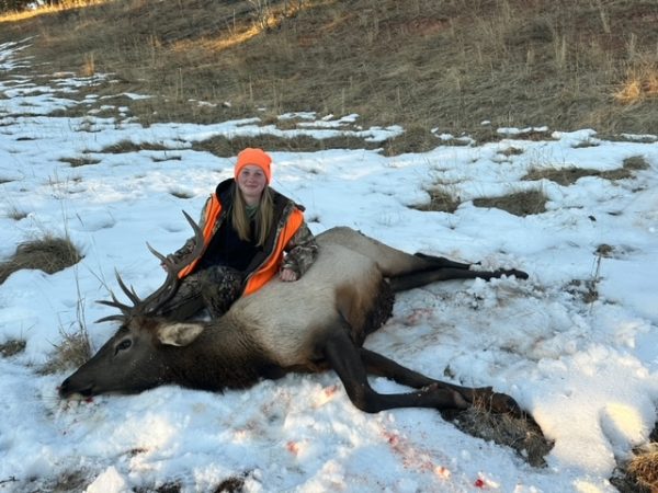 Tyrone sophomore Paige Carper and the 800+ pound elk that she got in December in Colorado. 