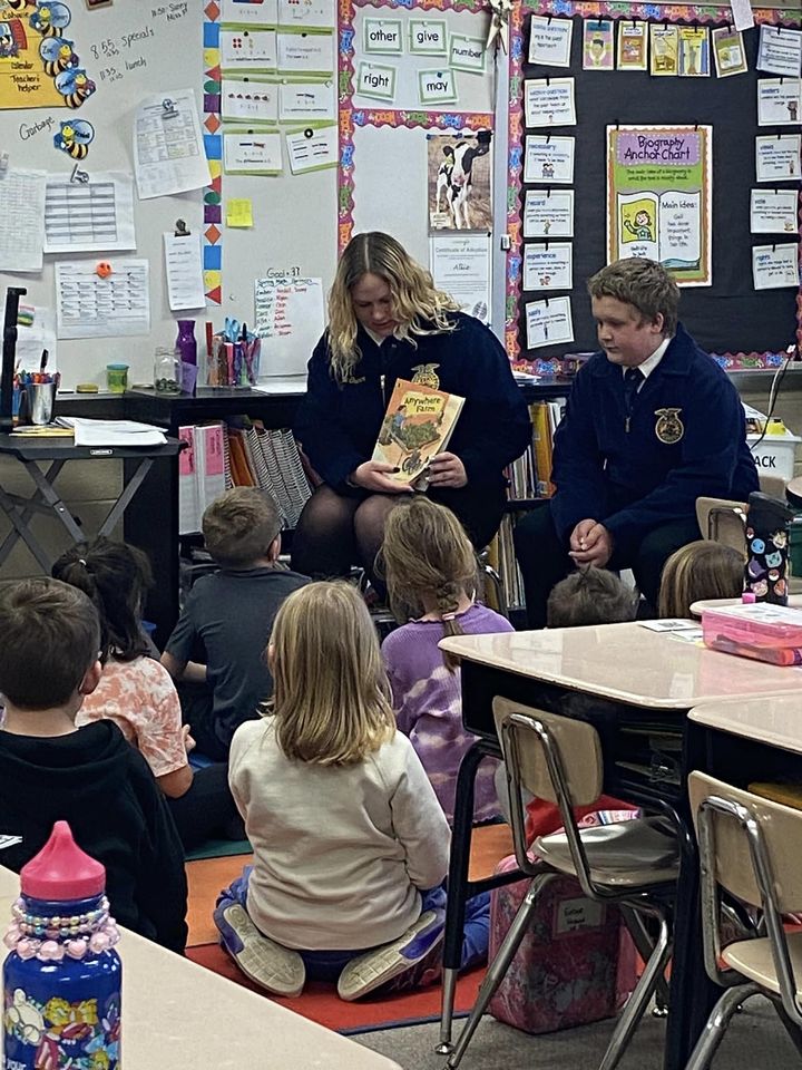 Gracie+Graham%2C+2nd+year+FFA+member+was+assisted+by+1st+year+FFA+member+Jeremy+Brower+in+first+reading+the+book+to+the+class+and+then+conducting+the+two+activities.+Both+enjoyed+being+able+to+share+their+knowledge+and+excitement+of+agriculture+with+youth.
