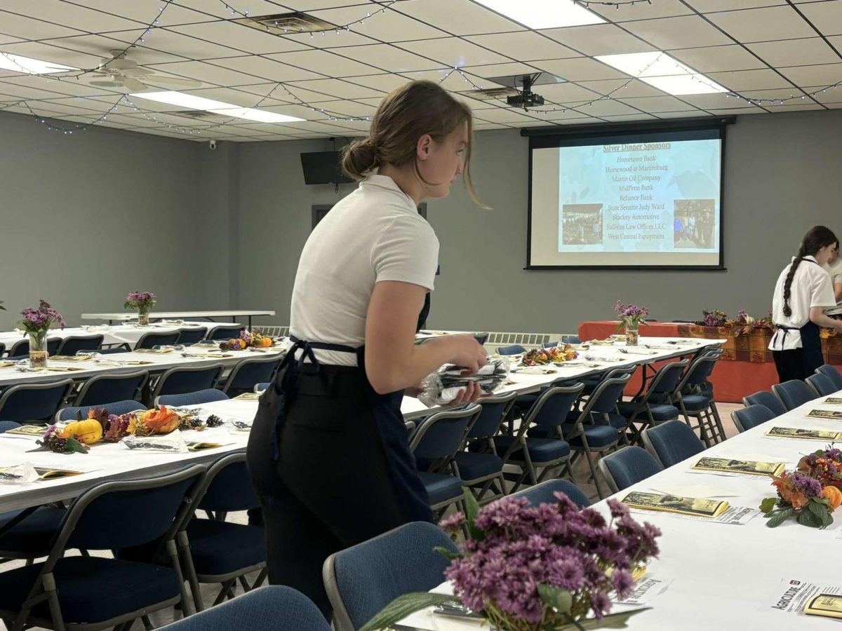 Pyper Sparklin setting the tables 